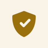 Shield with checkmark icon on beige background.